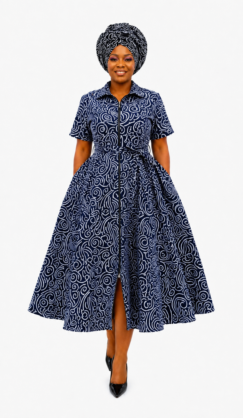 Navy swirl print Ankara shirt dress styled with matching headwrap, front view, handmade in South Africa