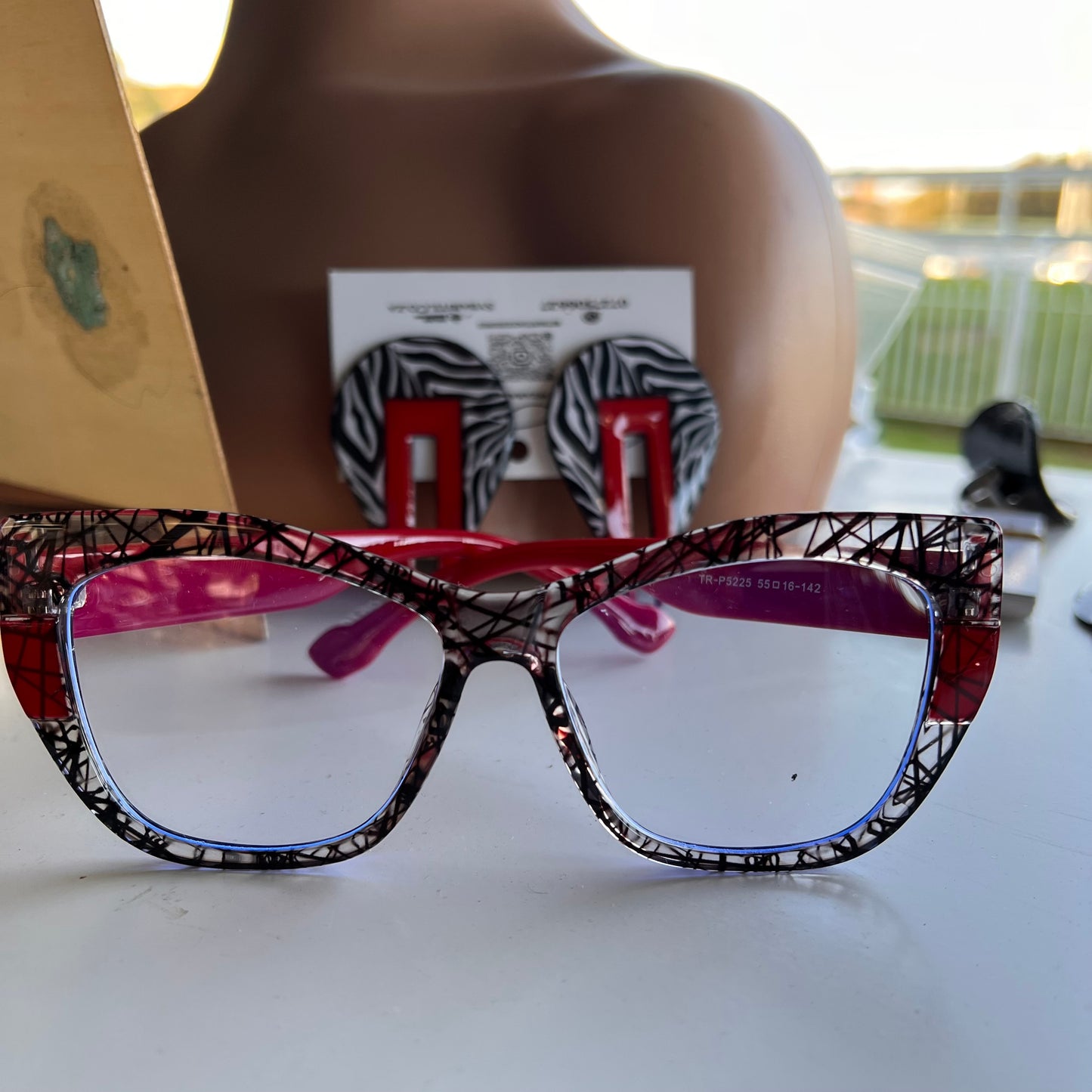 Red and clear black glasses