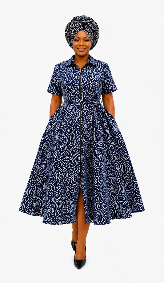 Navy swirl print Ankara shirt dress styled with matching headwrap, front view, handmade in South Africa